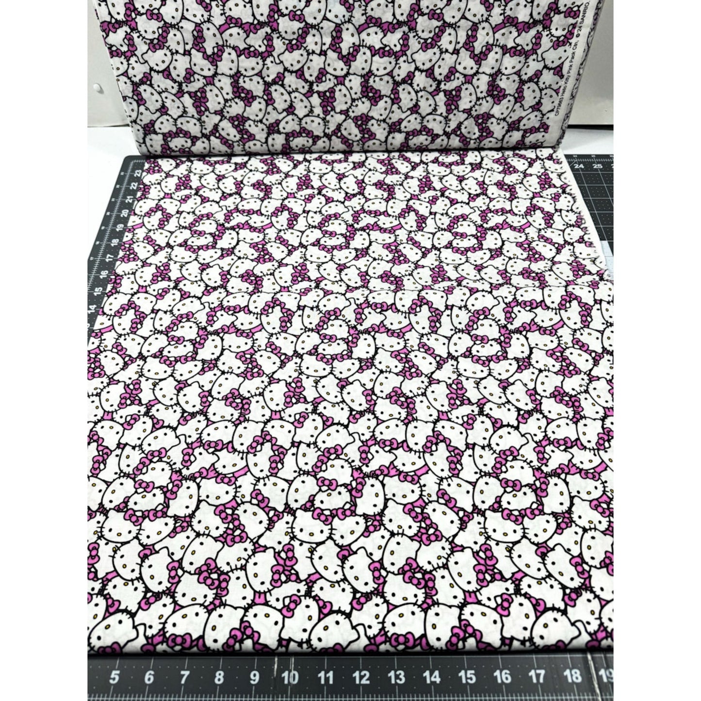 Packed Pink Hello Kitty Fabric CP79663 Pink Bow - Mary Jo Fabrics