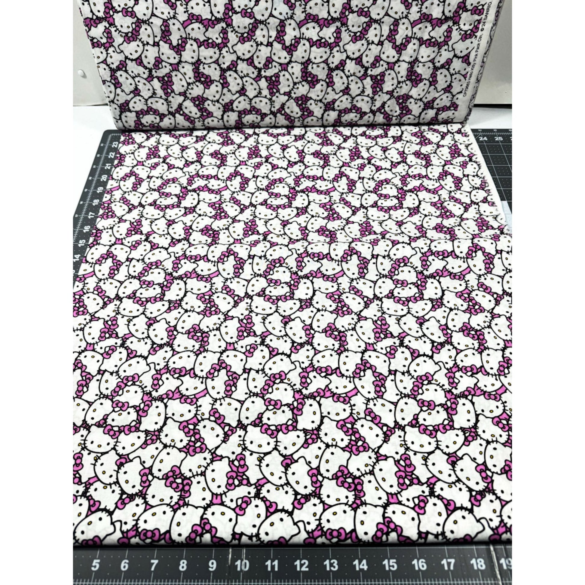 Packed Pink Hello Kitty Fabric CP79663 Pink Bow - Mary Jo Fabrics