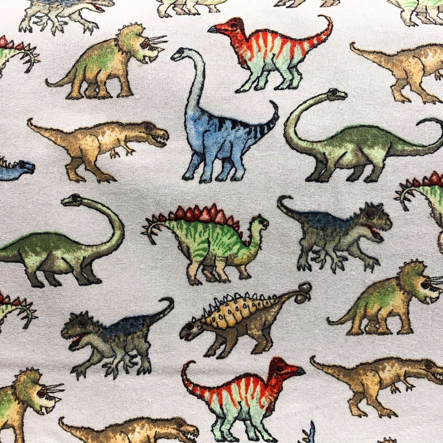 Real Dinosaur FLANNEL Fabric 1016 - 90 Light Gray - Mary Jo Fabrics