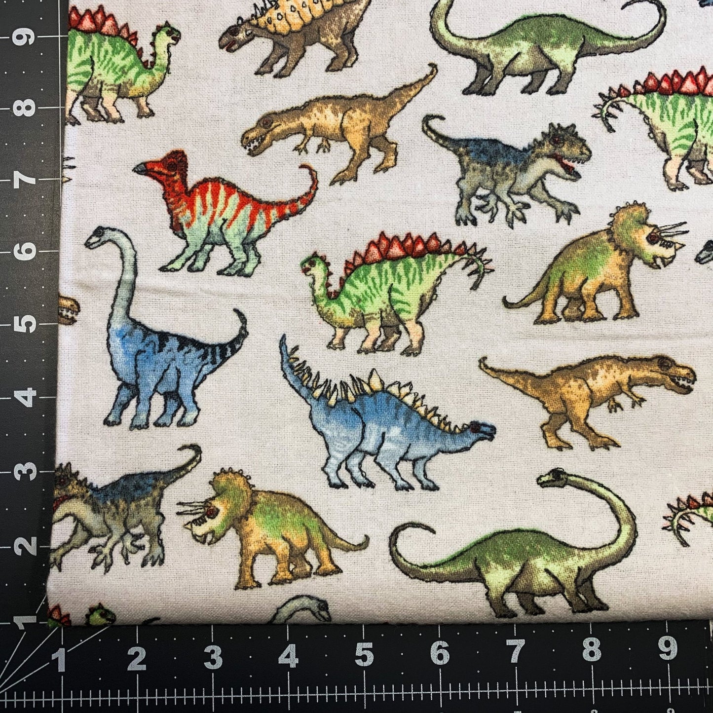 Real Dinosaur FLANNEL Fabric 1016 - 90 Light Gray - Mary Jo Fabrics