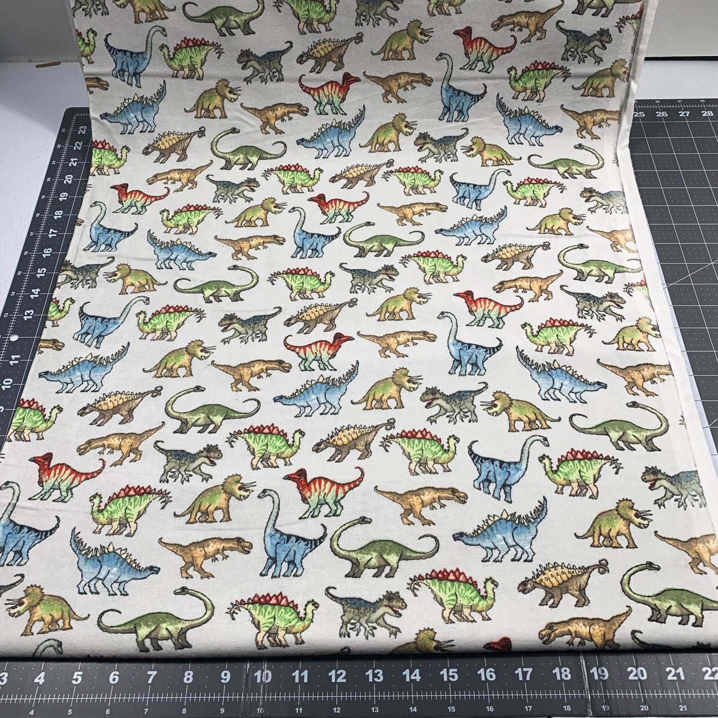 Real Dinosaur FLANNEL Fabric 1016 - 90 Light Gray - Mary Jo Fabrics