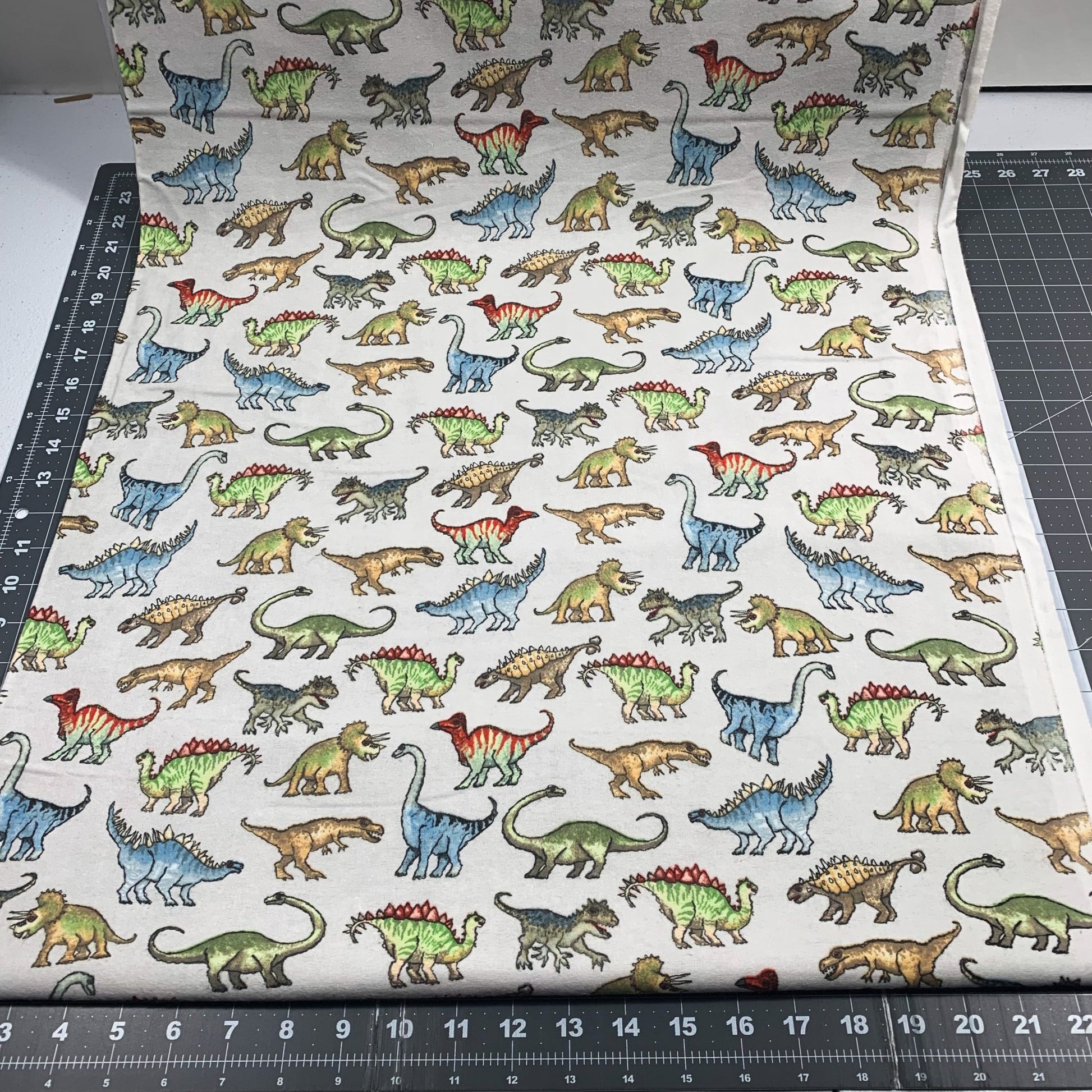 Real Dinosaur FLANNEL Fabric 1016 - 90 Light Gray - Mary Jo Fabrics