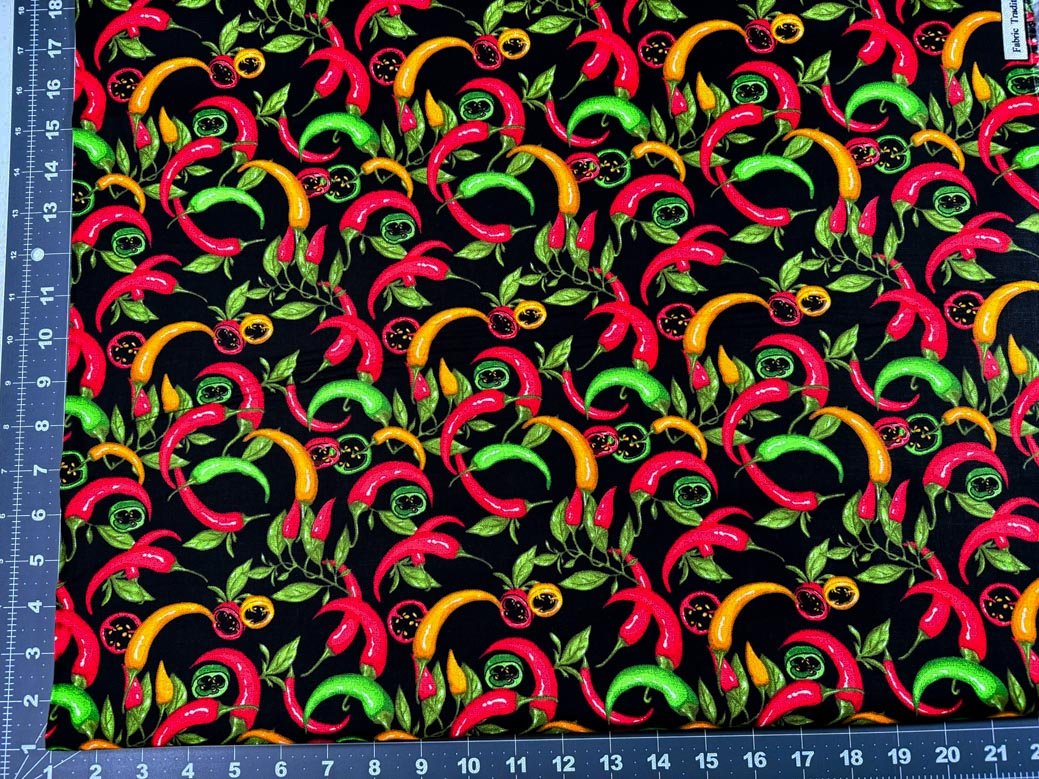 Red Hot Pepper fabric on black - Mary Jo Fabrics