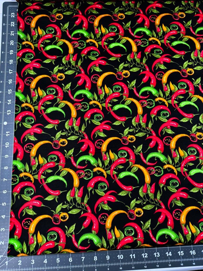 Red Hot Pepper fabric on black - Mary Jo Fabrics