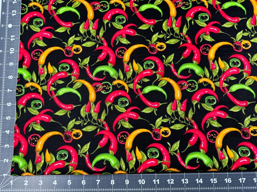 Red Hot Pepper fabric on black - Mary Jo Fabrics