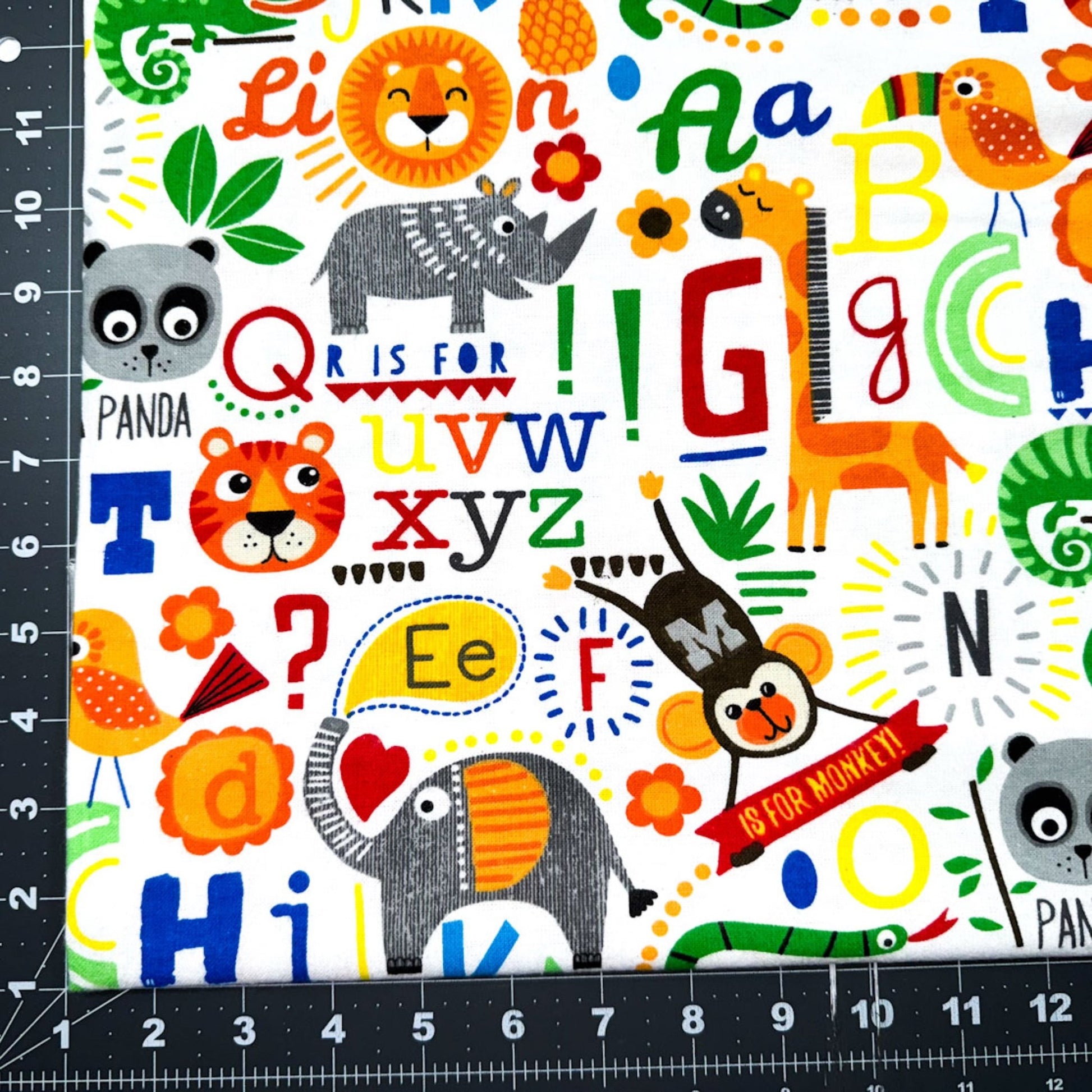 Safari Animal FLANNEL 0824 - 39 White Alphabet - Mary Jo Fabrics