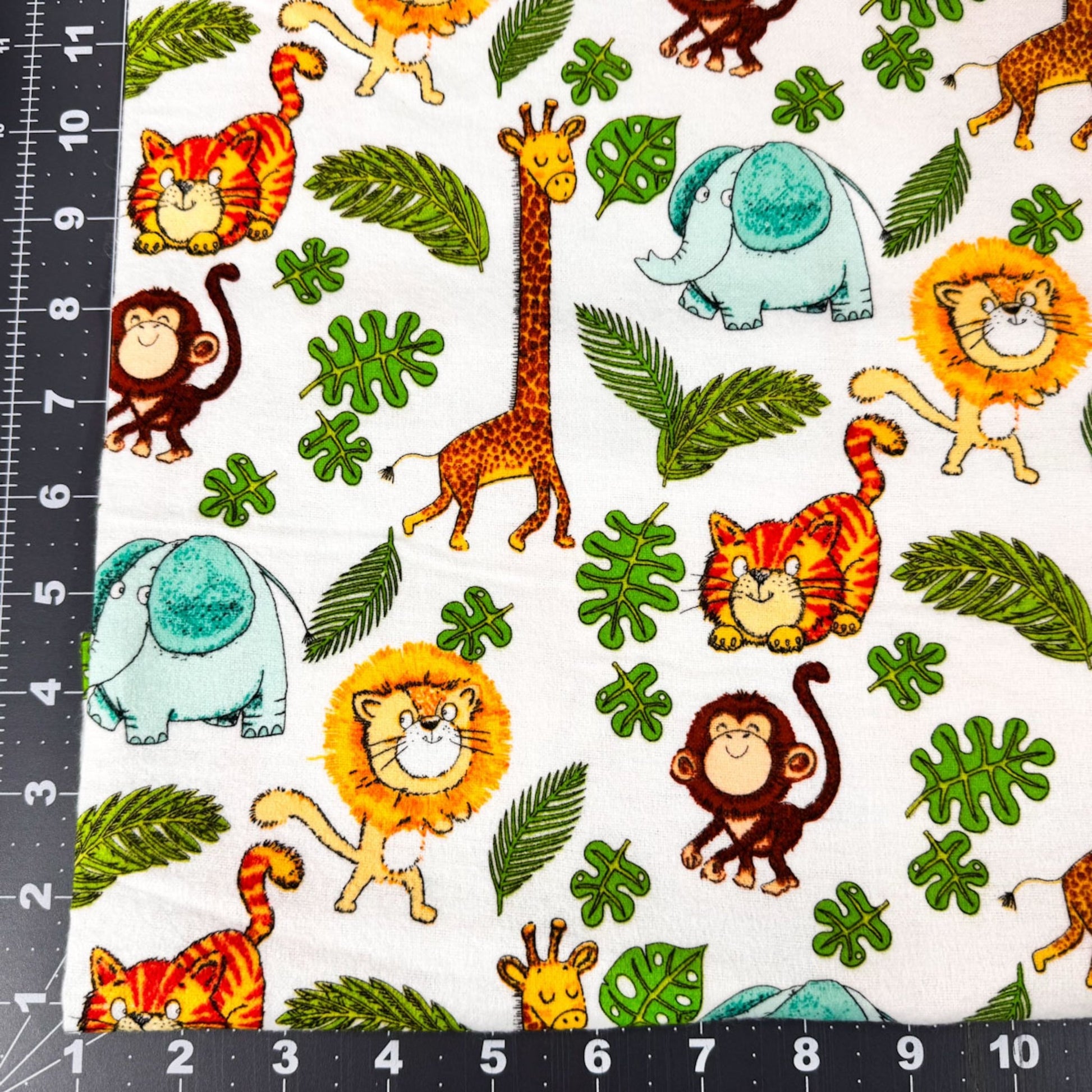Safari Animal FLANNEL fabric 14922 lion giraffe monkey - Mary Jo Fabrics