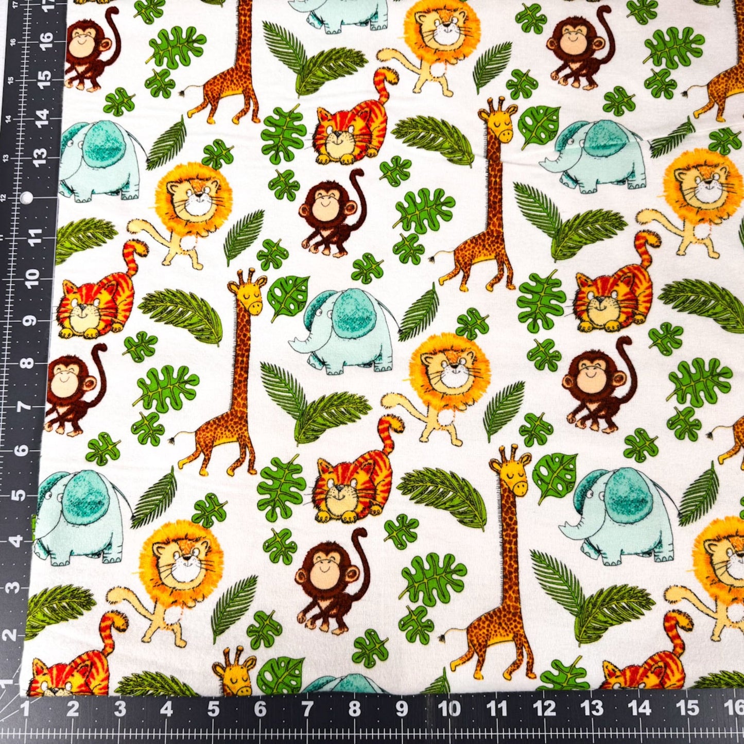 Safari Animal FLANNEL fabric 14922 lion giraffe monkey - Mary Jo Fabrics