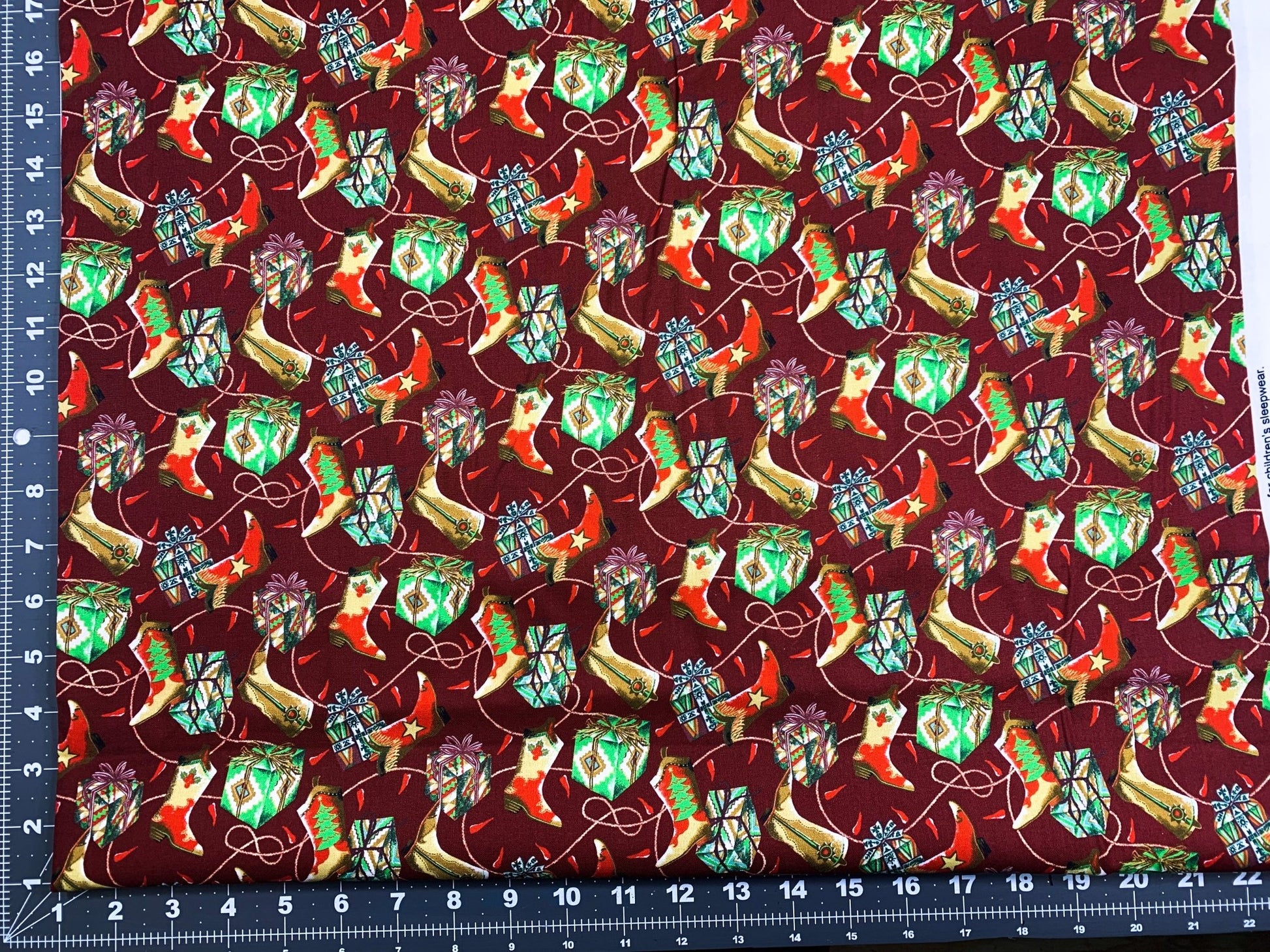 Santa Fe Christmas cotton fabric Cowboy boot - Mary Jo Fabrics