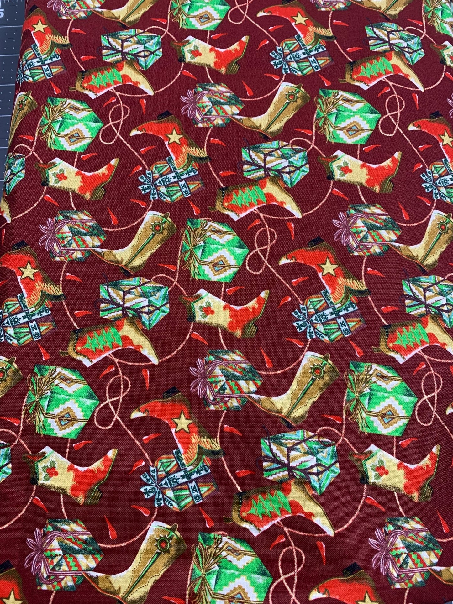 Santa Fe Christmas cotton fabric Cowboy boot - Mary Jo Fabrics