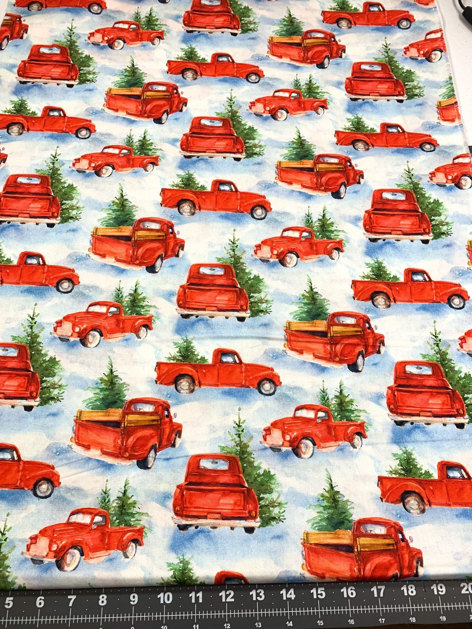 Snowfall on the Range Red Truck Christmas fabric - Mary Jo Fabrics