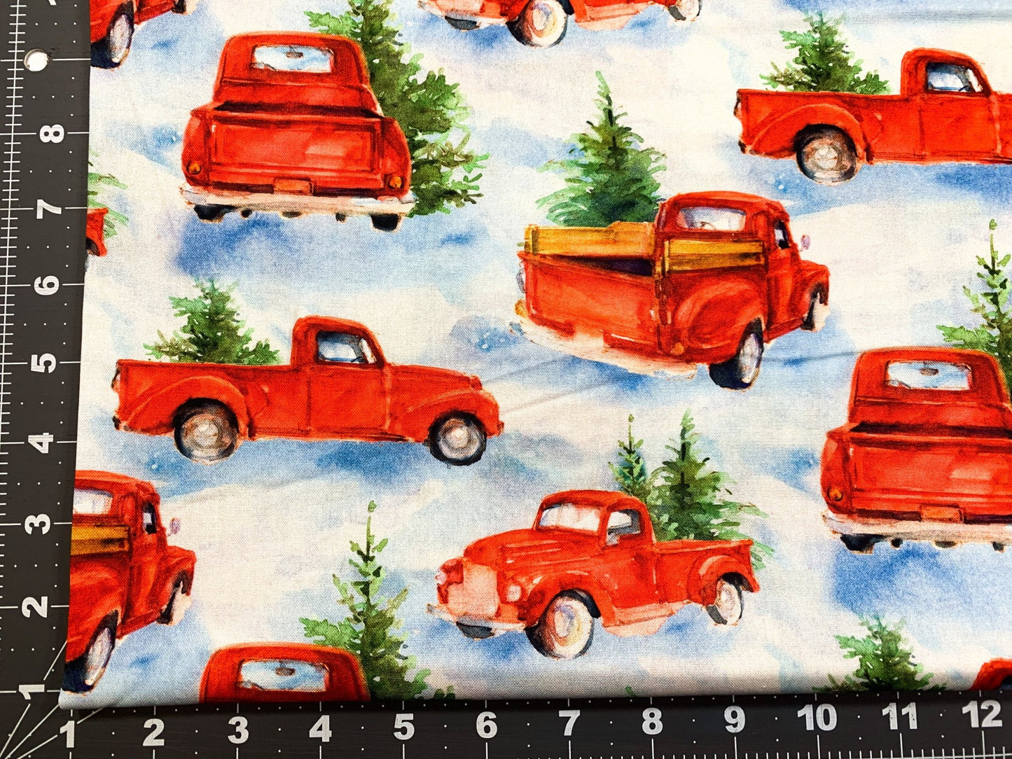 Snowfall on the Range Red Truck Christmas fabric - Mary Jo Fabrics