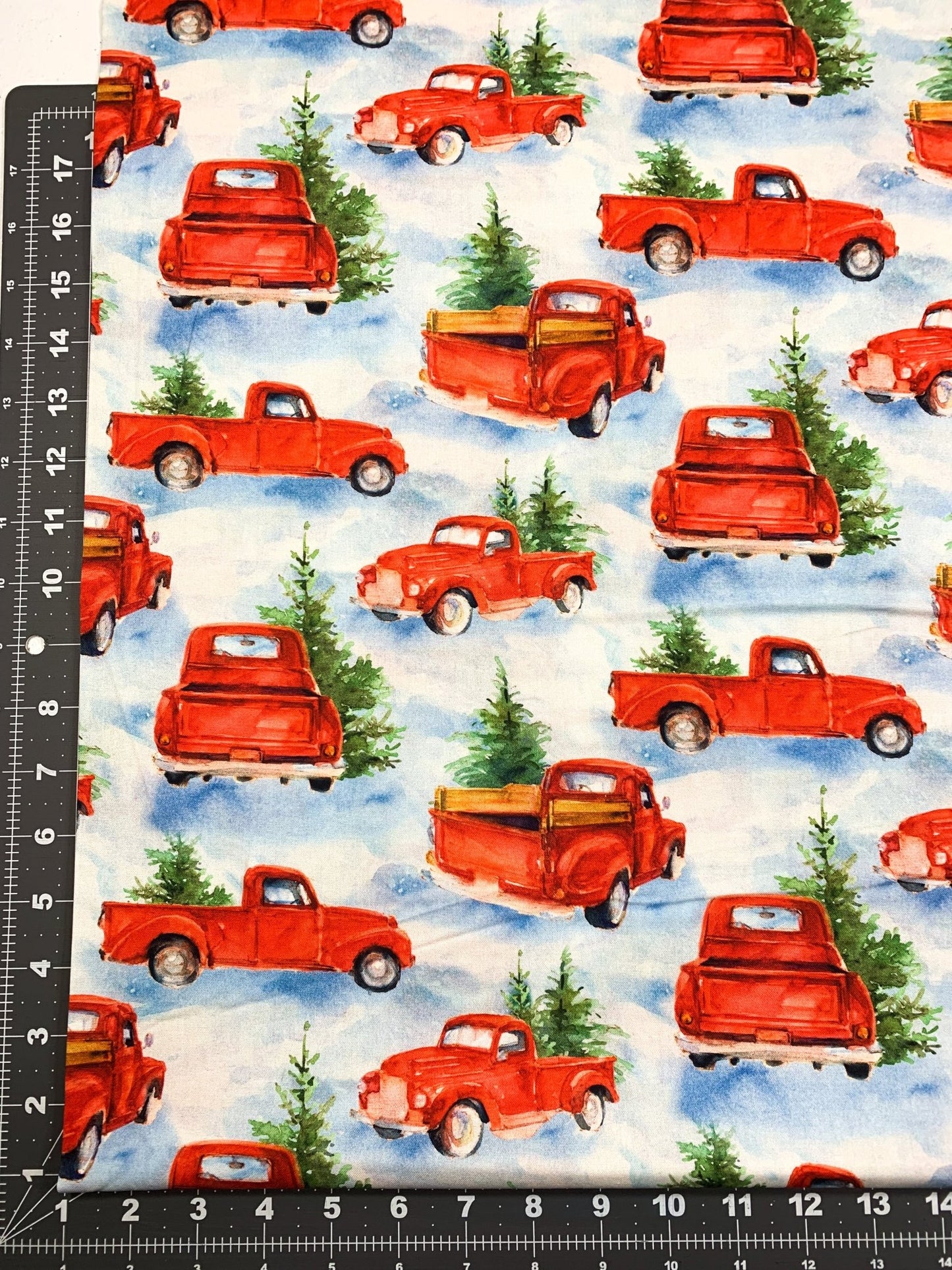 Snowfall on the Range Red Truck Christmas fabric - Mary Jo Fabrics