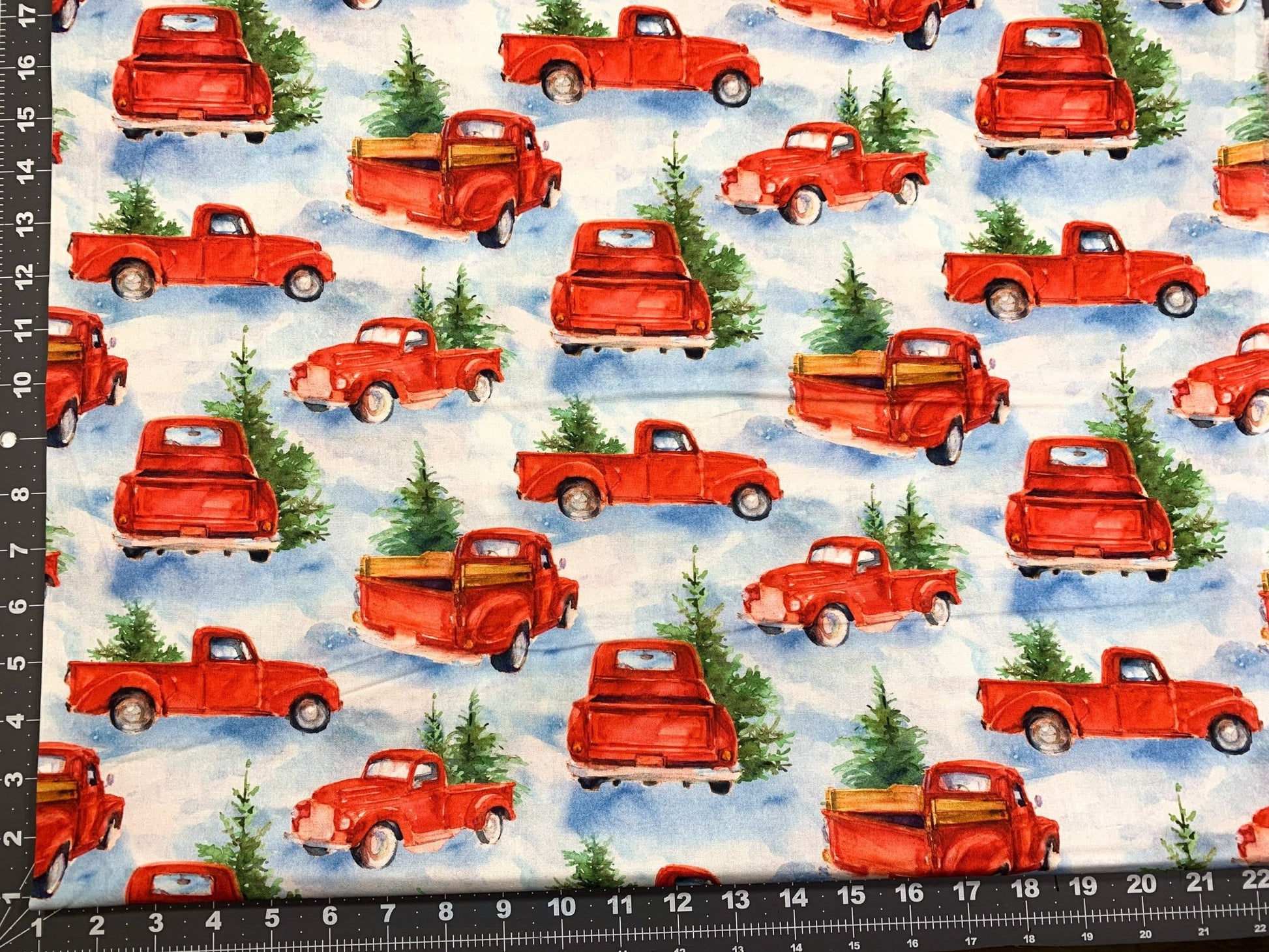 Snowfall on the Range Red Truck Christmas fabric - Mary Jo Fabrics