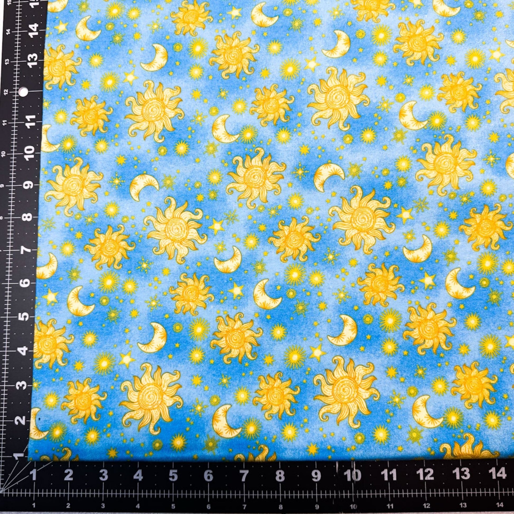 Sun Moon and Stars Cotton Flannel 1051 - 11 Blue Suns and Stars - Mary Jo Fabrics
