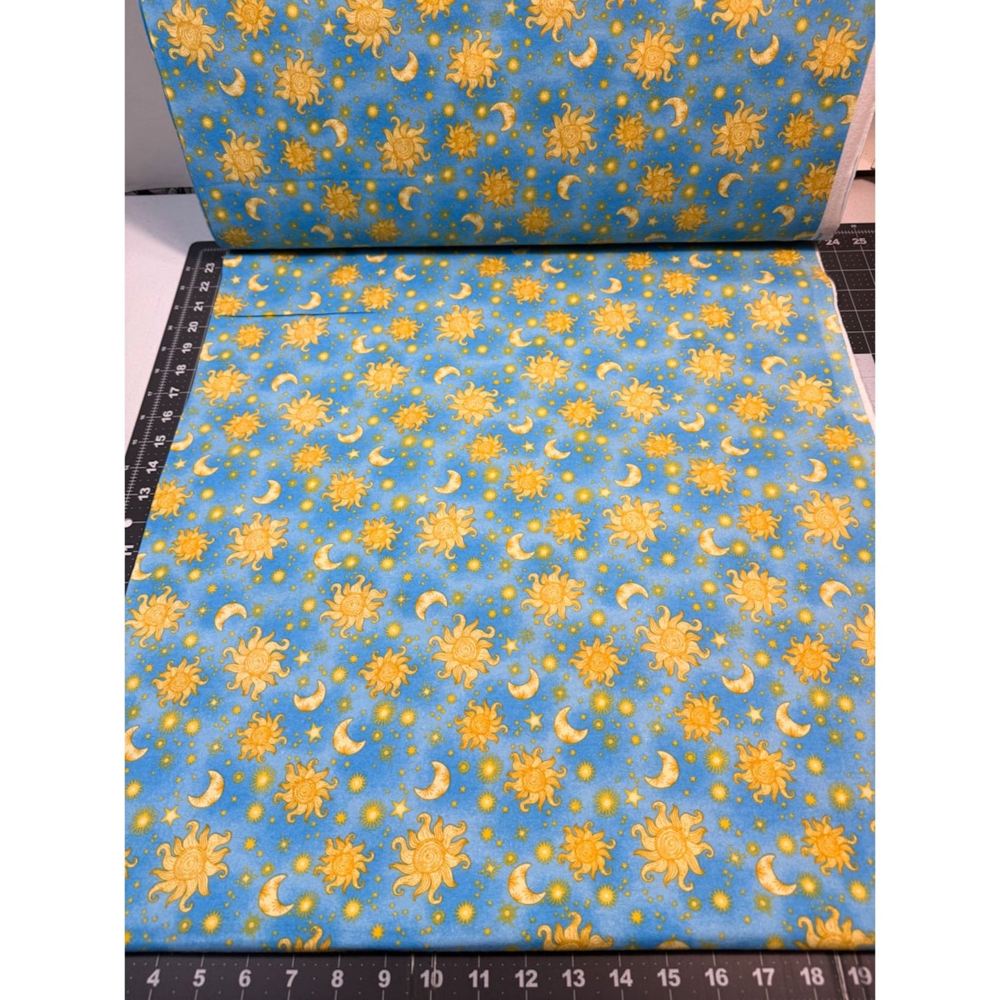 Sun Moon and Stars Cotton Flannel 1051 - 11 Blue Suns and Stars - Mary Jo Fabrics