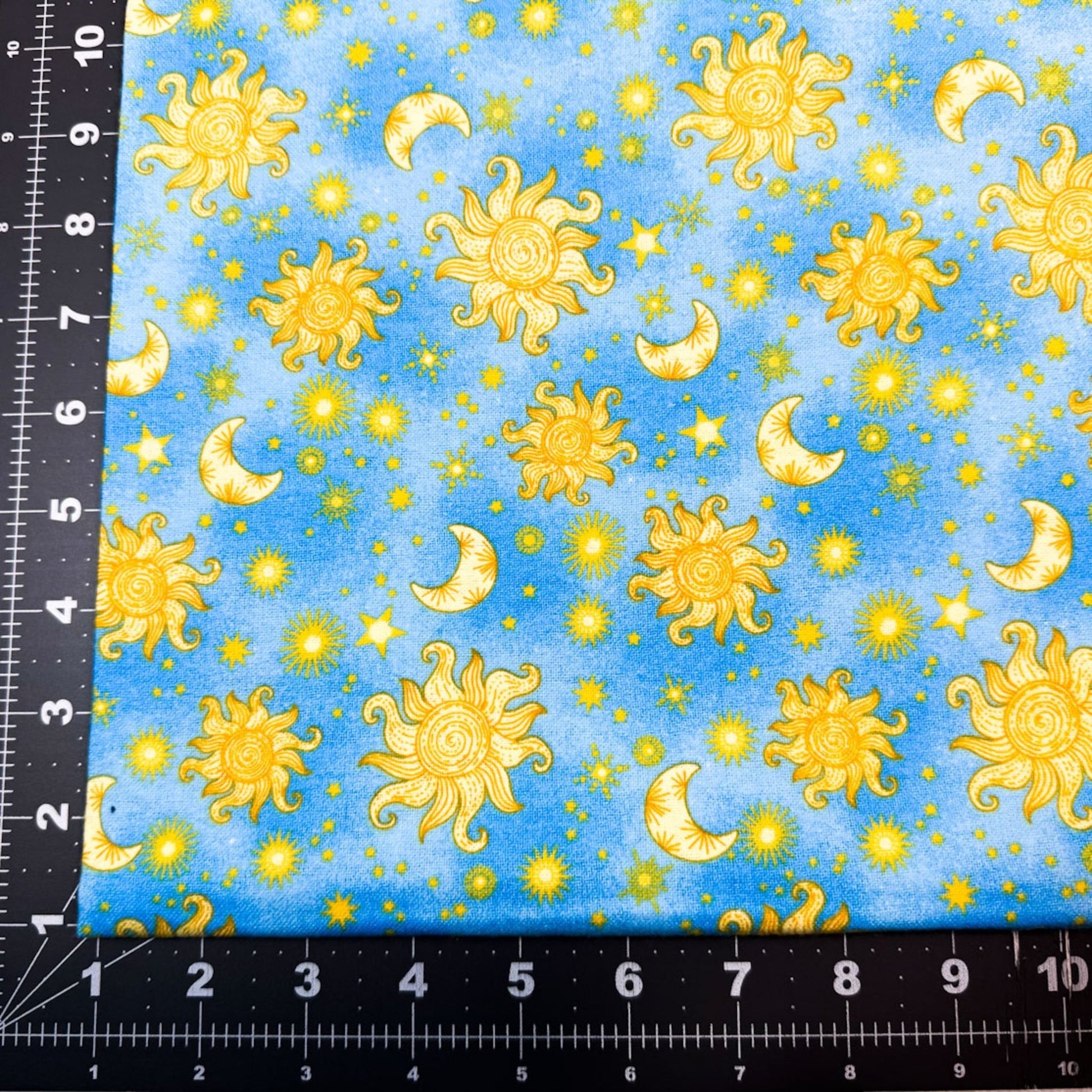 Sun Moon and Stars Cotton Flannel 1051 - 11 Blue Suns and Stars - Mary Jo Fabrics