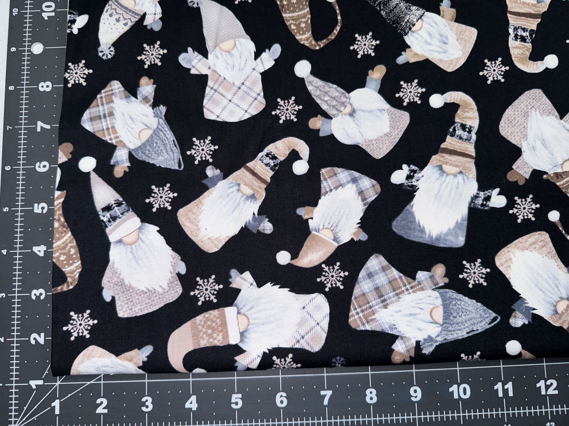 Tossed White Holiday Gnomes fabric C8207 - Mary Jo Fabrics