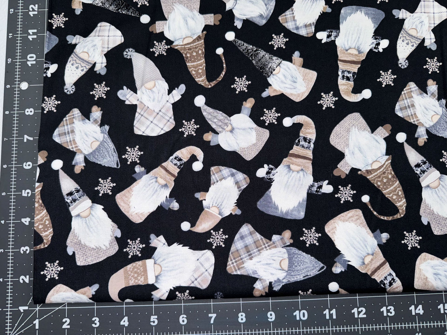 Tossed White Holiday Gnomes fabric C8207 - Mary Jo Fabrics