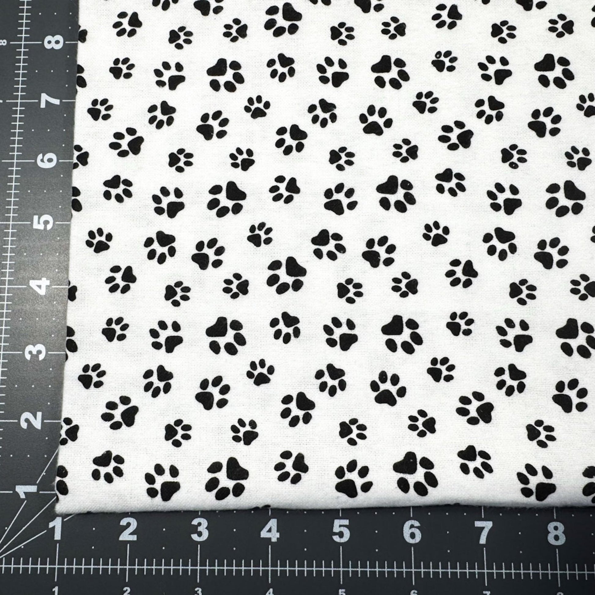 White Paw Print Flannel 1064 - 9 Dog Paws Flannel - Mary Jo Fabrics