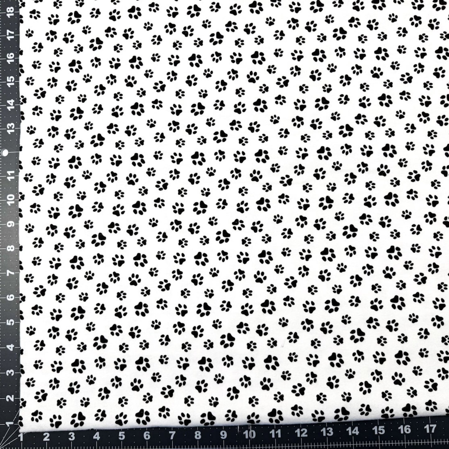 White Paw Print Flannel 1064 - 9 Dog Paws Flannel - Mary Jo Fabrics