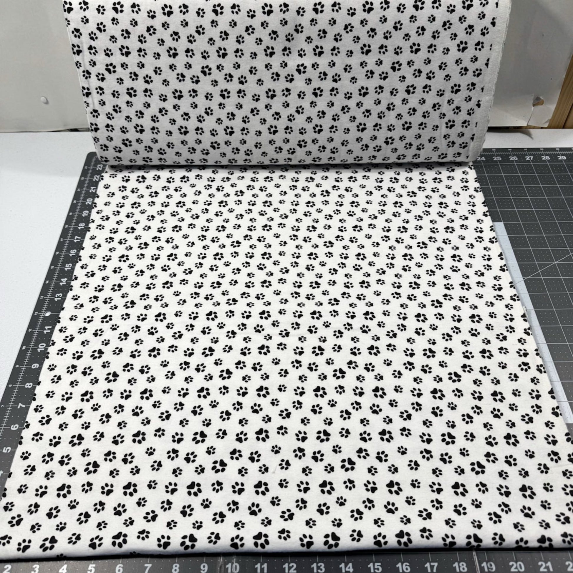 White Paw Print Flannel 1064 - 9 Dog Paws Flannel - Mary Jo Fabrics