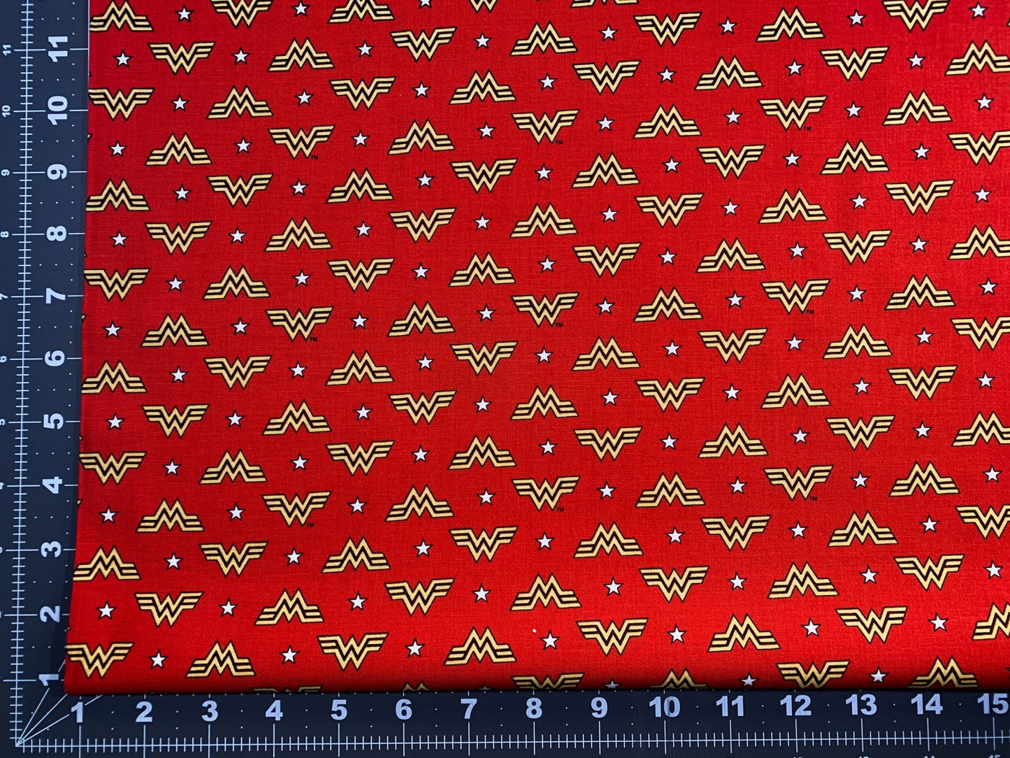 Wonder Woman fabric WW84 WW logo and stars - Mary Jo Fabrics