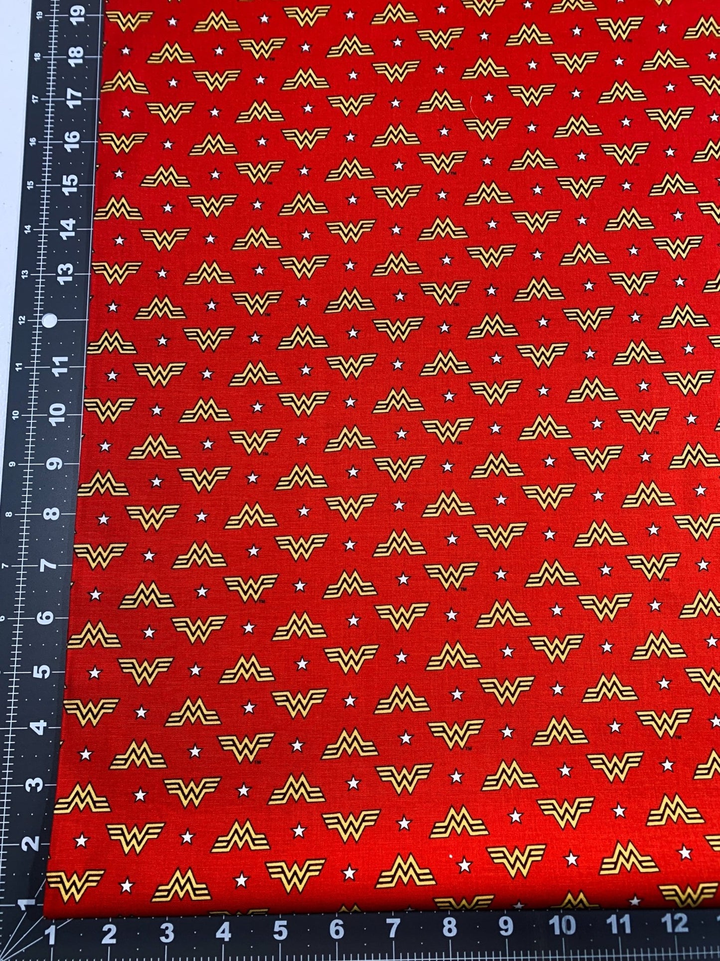 Wonder Woman fabric WW84 WW logo and stars - Mary Jo Fabrics