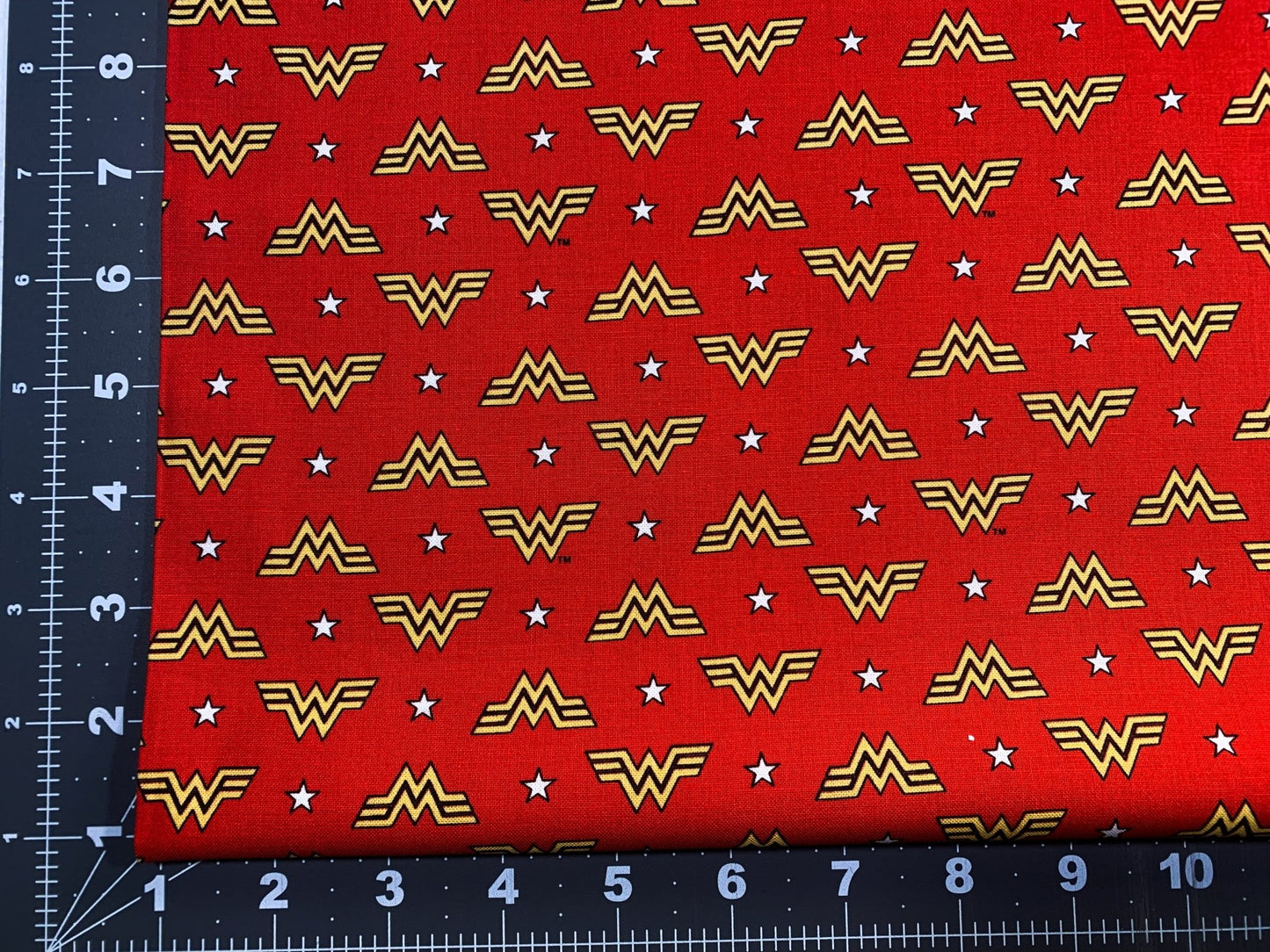 Wonder Woman fabric WW84 WW logo and stars - Mary Jo Fabrics