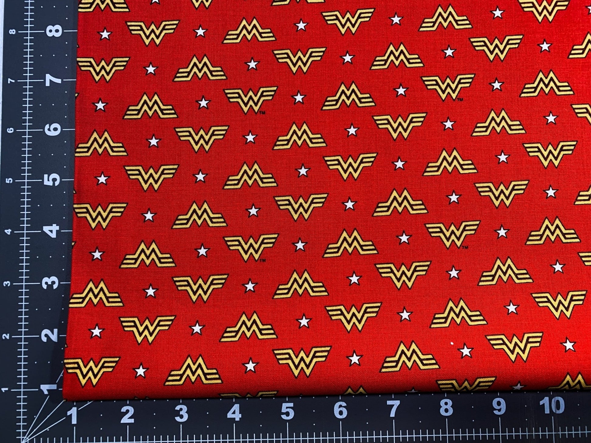 Wonder Woman fabric WW84 WW logo and stars - Mary Jo Fabrics