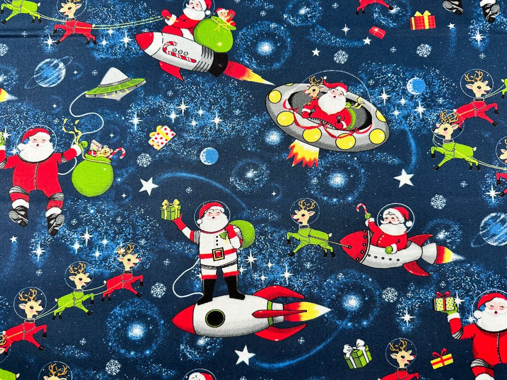 Yule Cool Santa Claus fabric D108 Santa in space - Mary Jo Fabrics