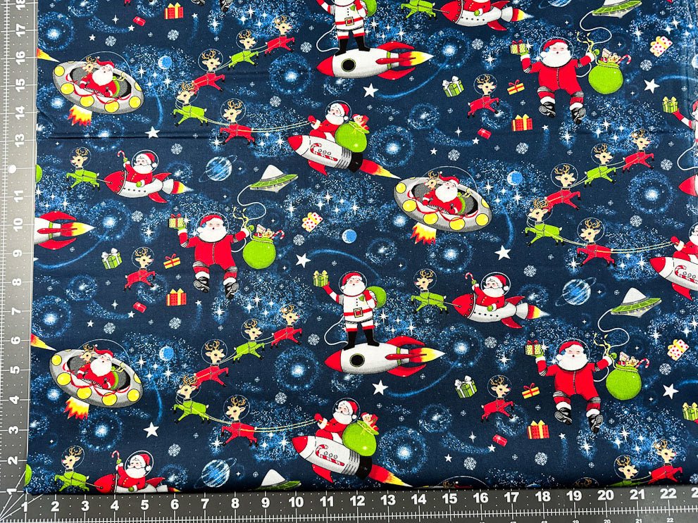 Yule Cool Santa Claus fabric D108 Santa in space - Mary Jo Fabrics